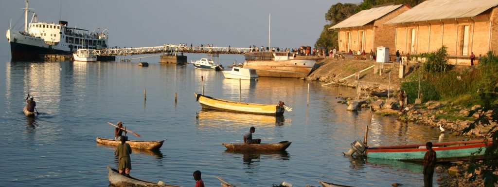Image of fishermen riding boats on Nkhata Bay